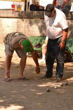 Men of Provence are precise and passionate boules players, as Vreeland shows in an animated scene: Photo Copyright Marcia M. Mueller